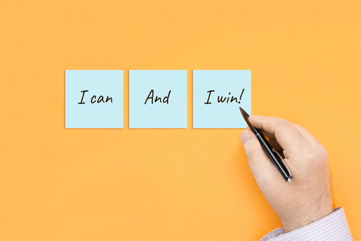 An image of sticky notes with the words I can and I win.