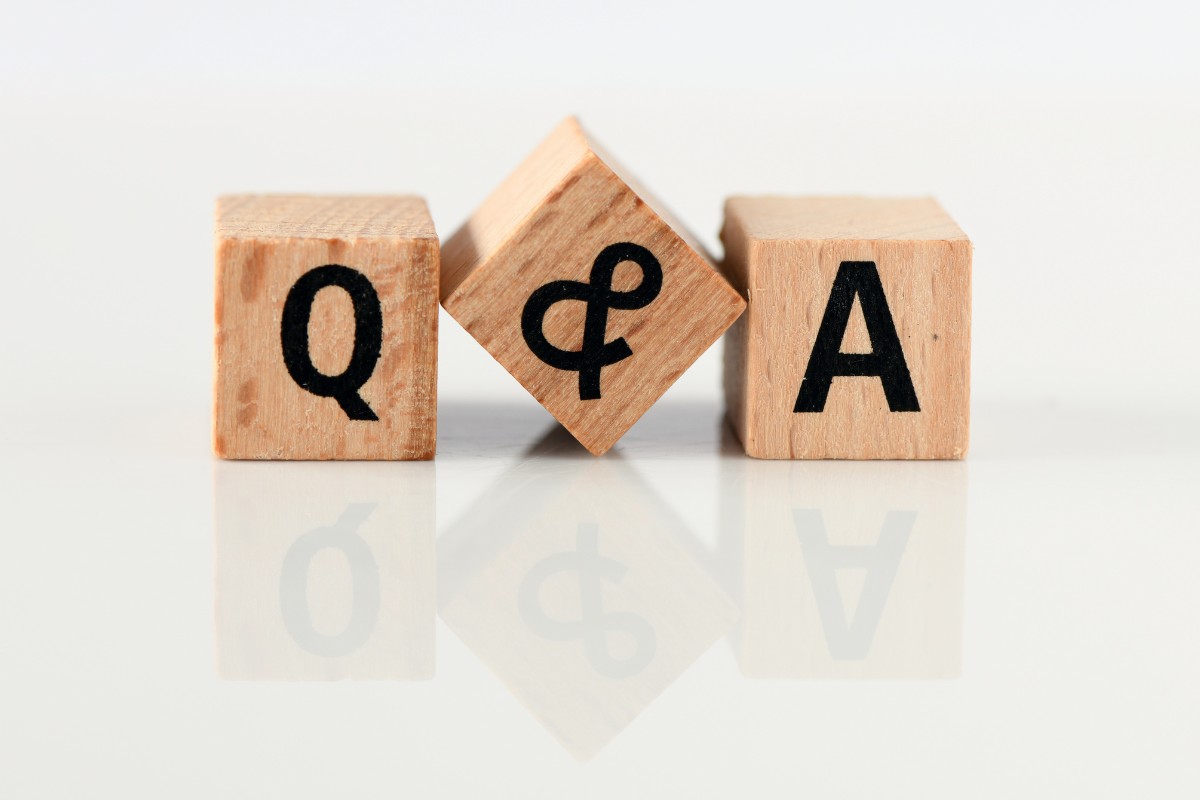 Wooden cubes with the letters Q & A.