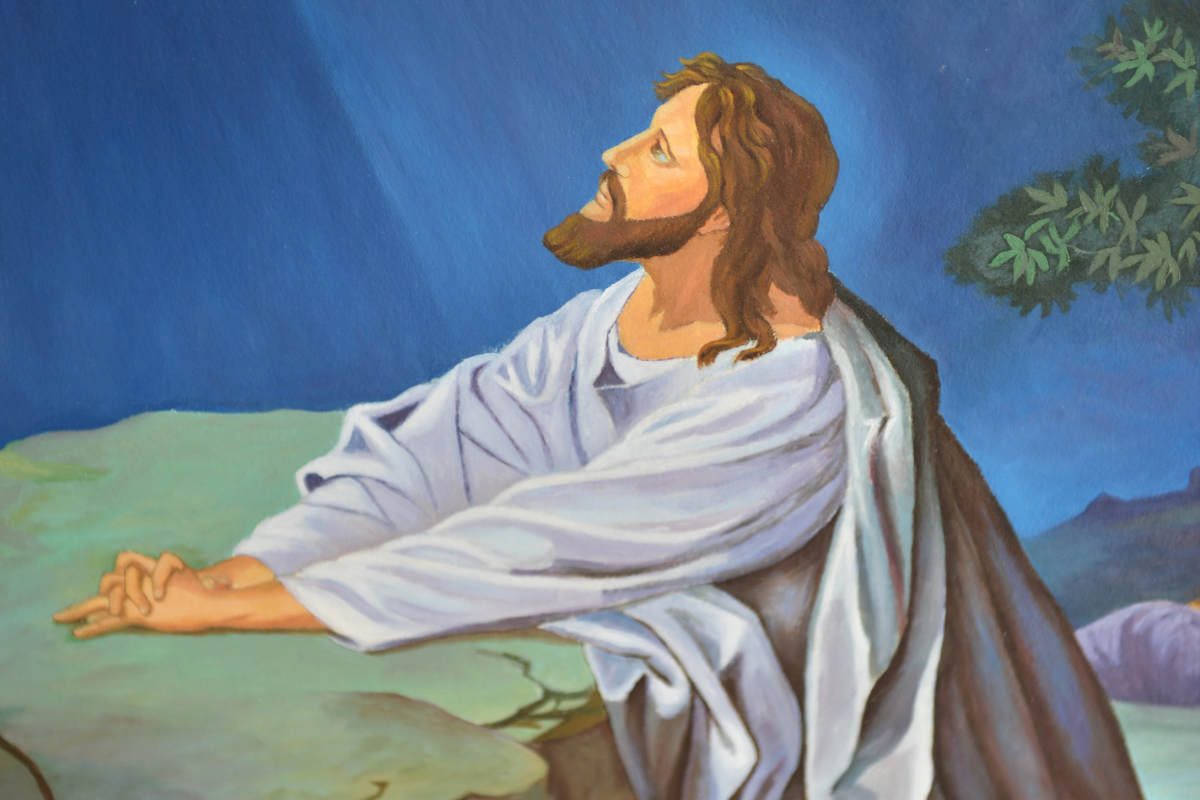Jesus praying in the garden of Gethsemane.