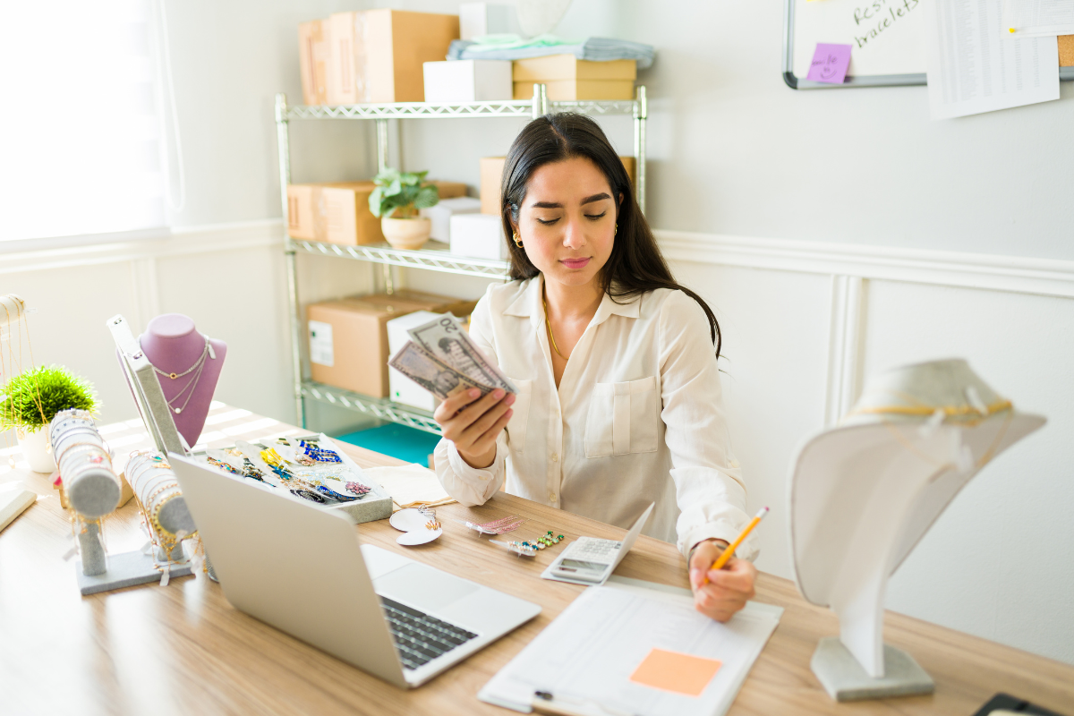 A woman selling products generating money.