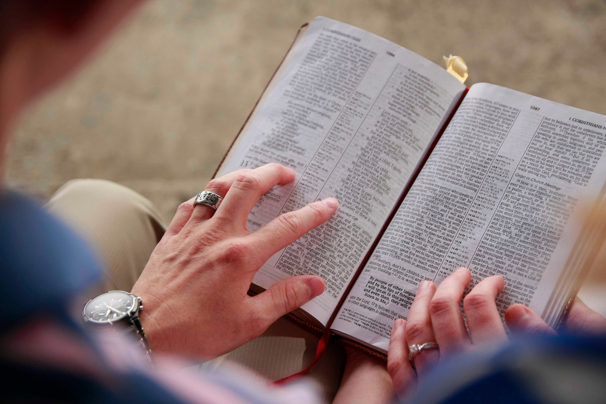 An image of a couple reading the Bible together.
