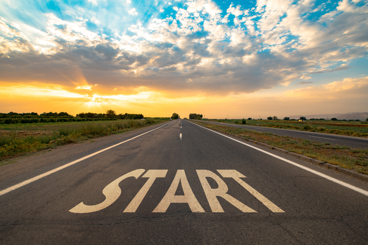 A lone highway with the words START written on it.