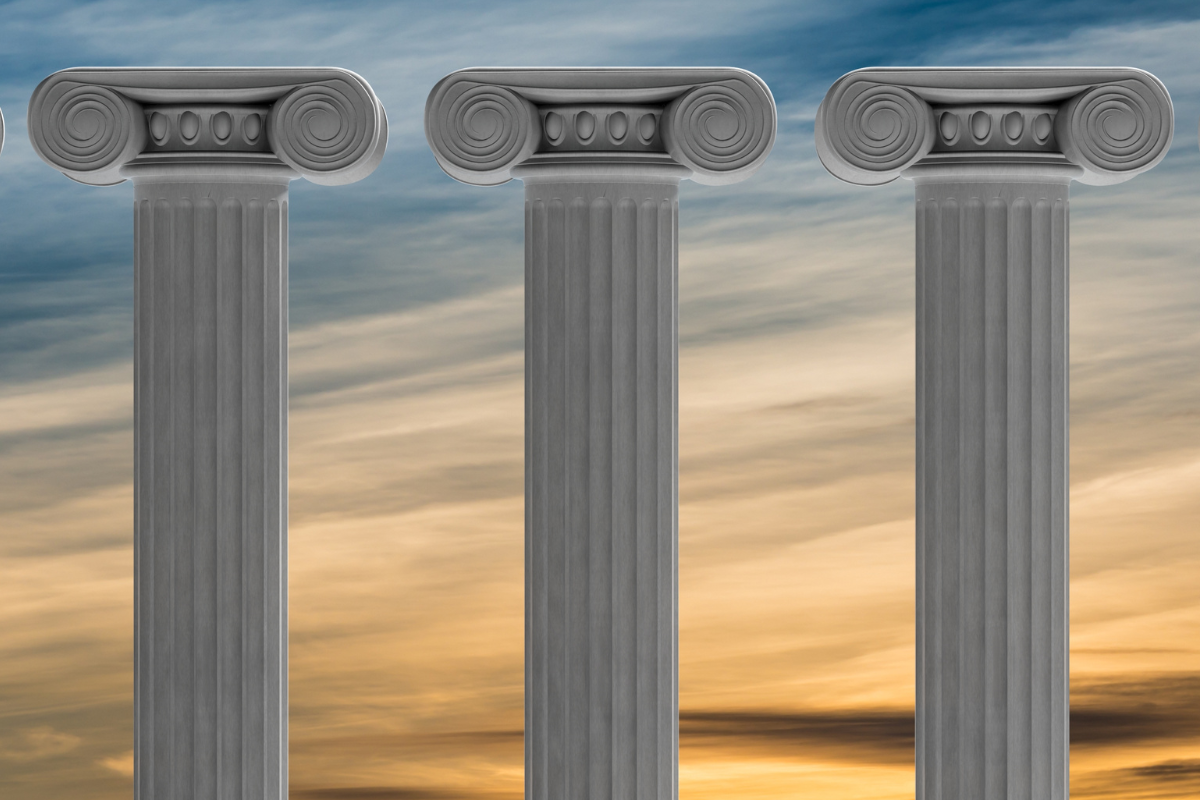 An image of three stone pillars.