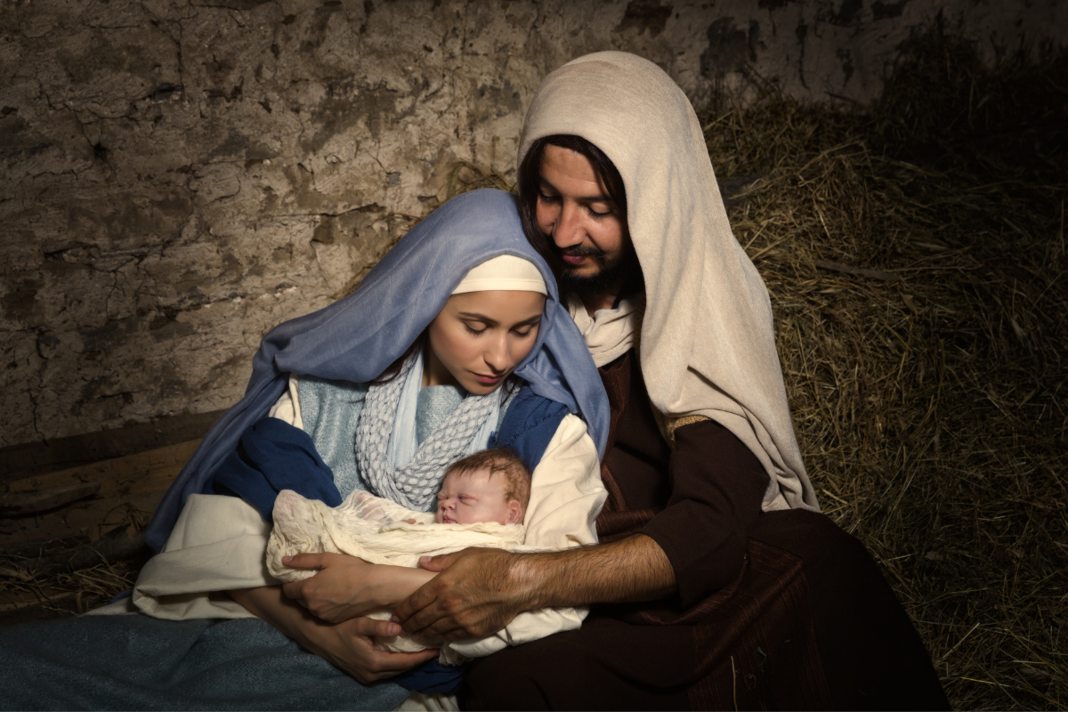 An illustration of Jesus' birth with Mary and Joseph.