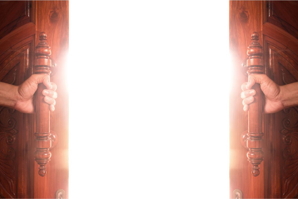 An image of doors being opened, with bright light flooding in.