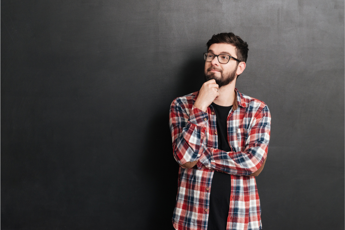 A man in a thinking position.
