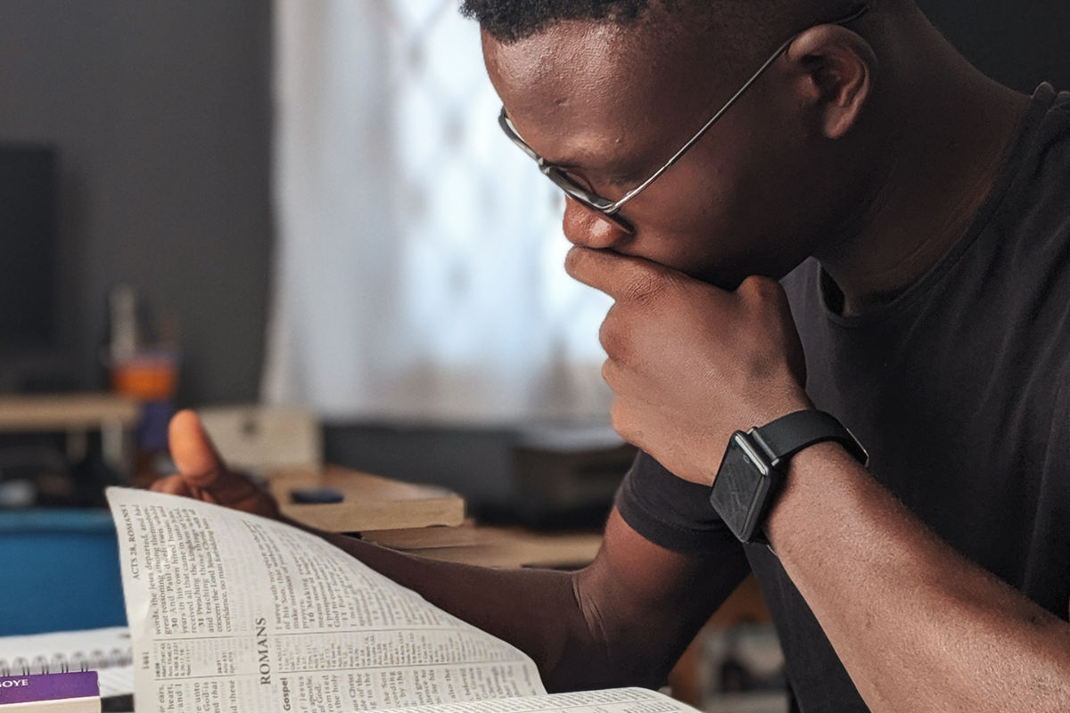 A man reading the Holy Bible.