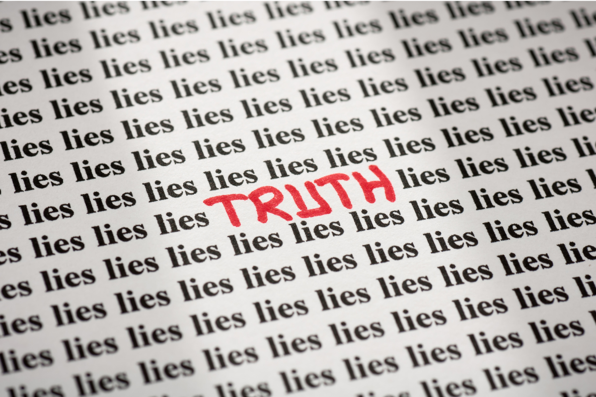 The word TRUTH written in red ink, surrounded by the words 'lies'.