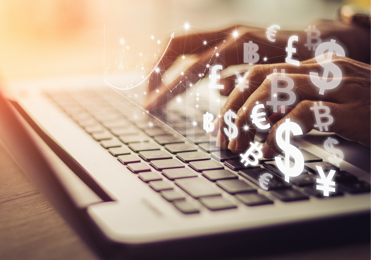 An image of hands typing on a laptop, with different currency symbols highlighted.