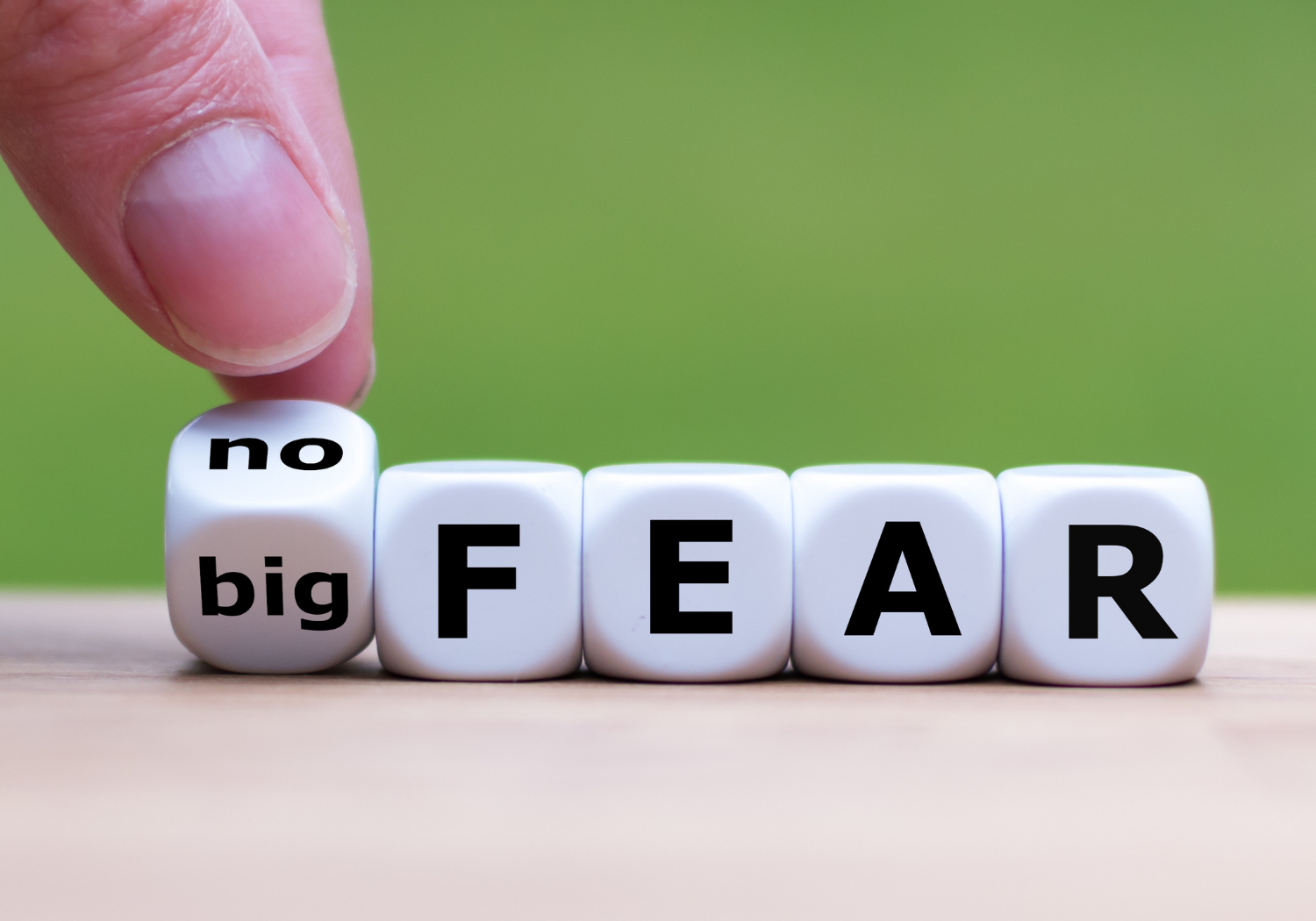 Word cubes that spell: NO FEAR, BIG FEAR.