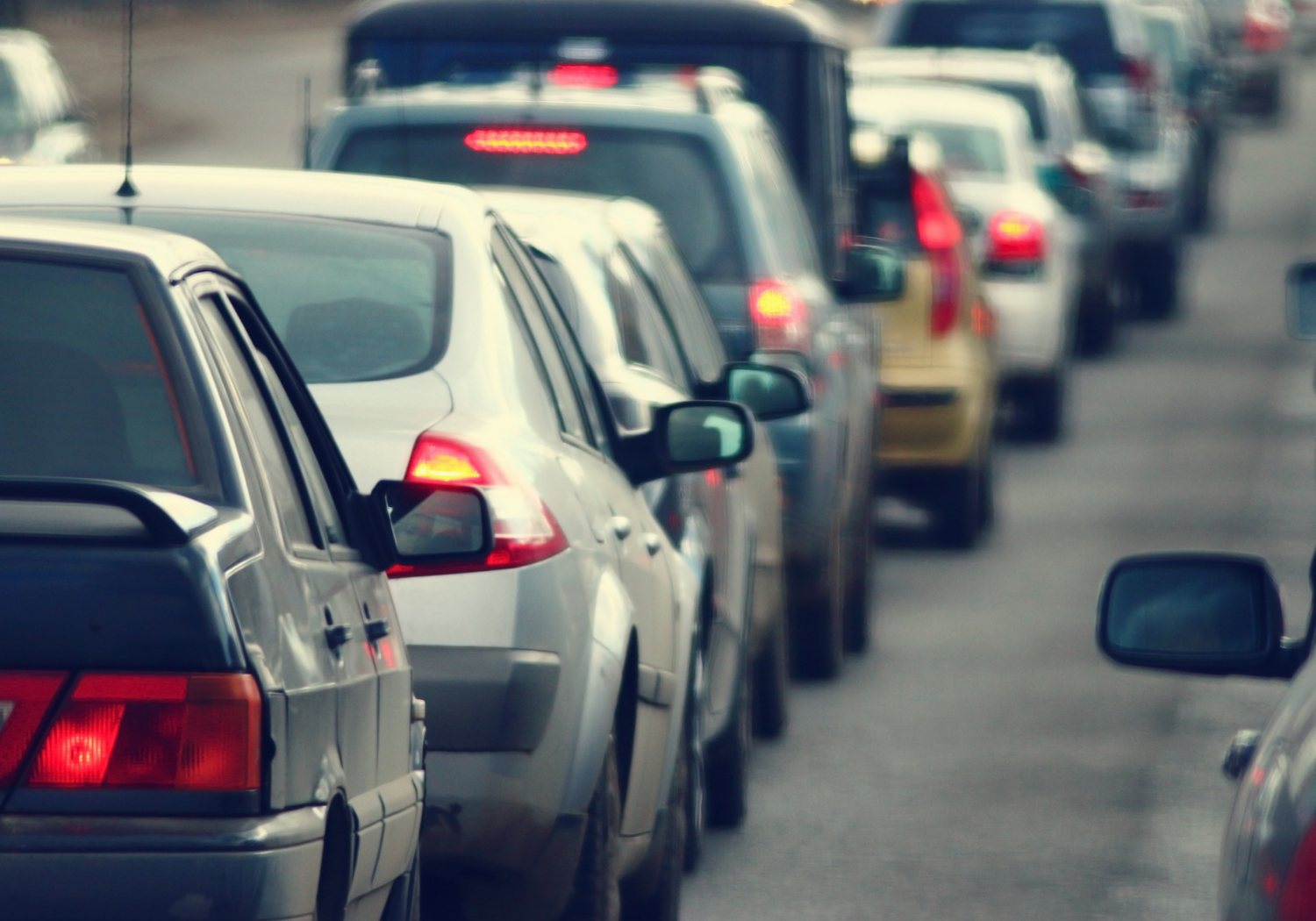 Lines of cars in a busy street.