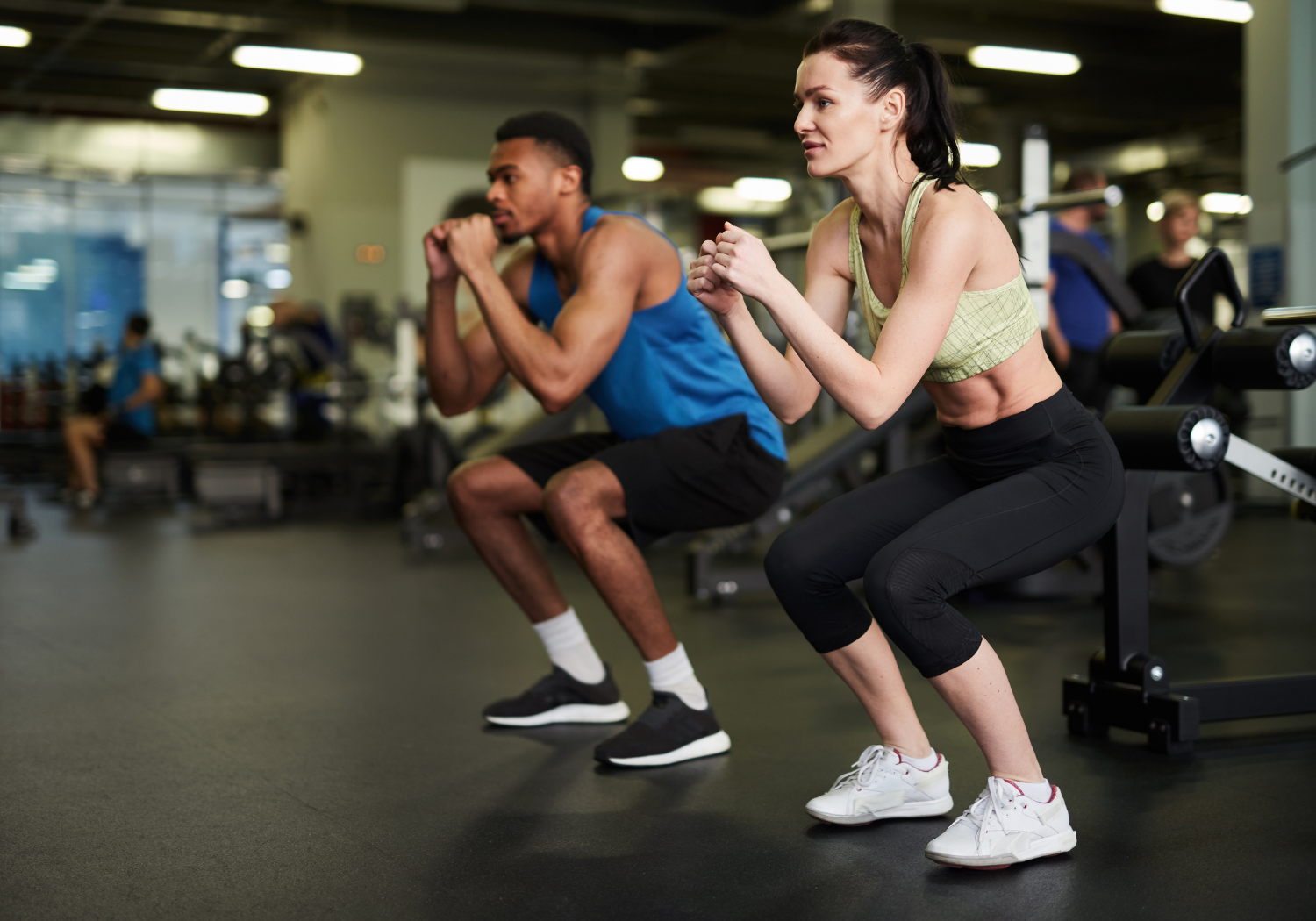 A group of people working out in a gym.