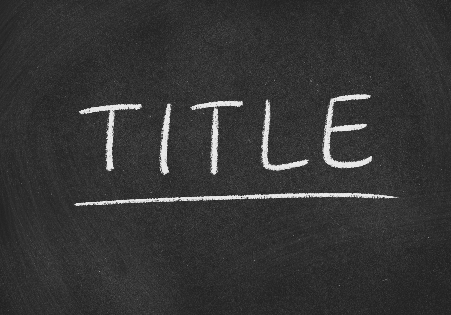 The word TITLE written on a blackboard.