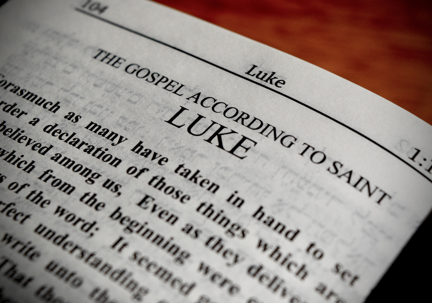 A closeup of the first page of the gospel of Luke.