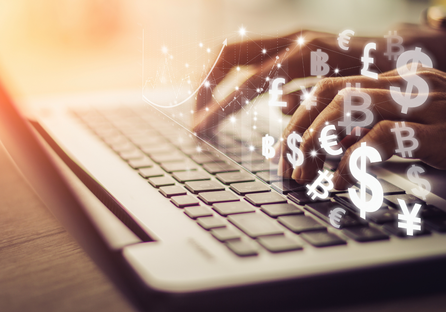 A person typing on a laptop, with different currency symbols being shown.