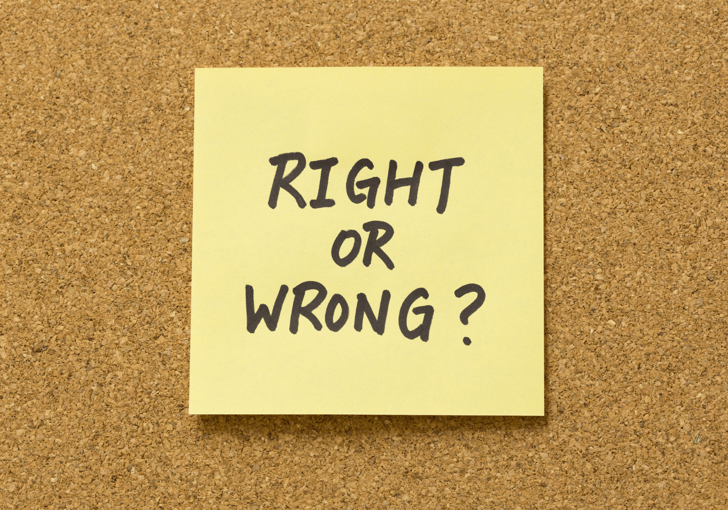 A post-it with the words RIGHT OR WRONG?