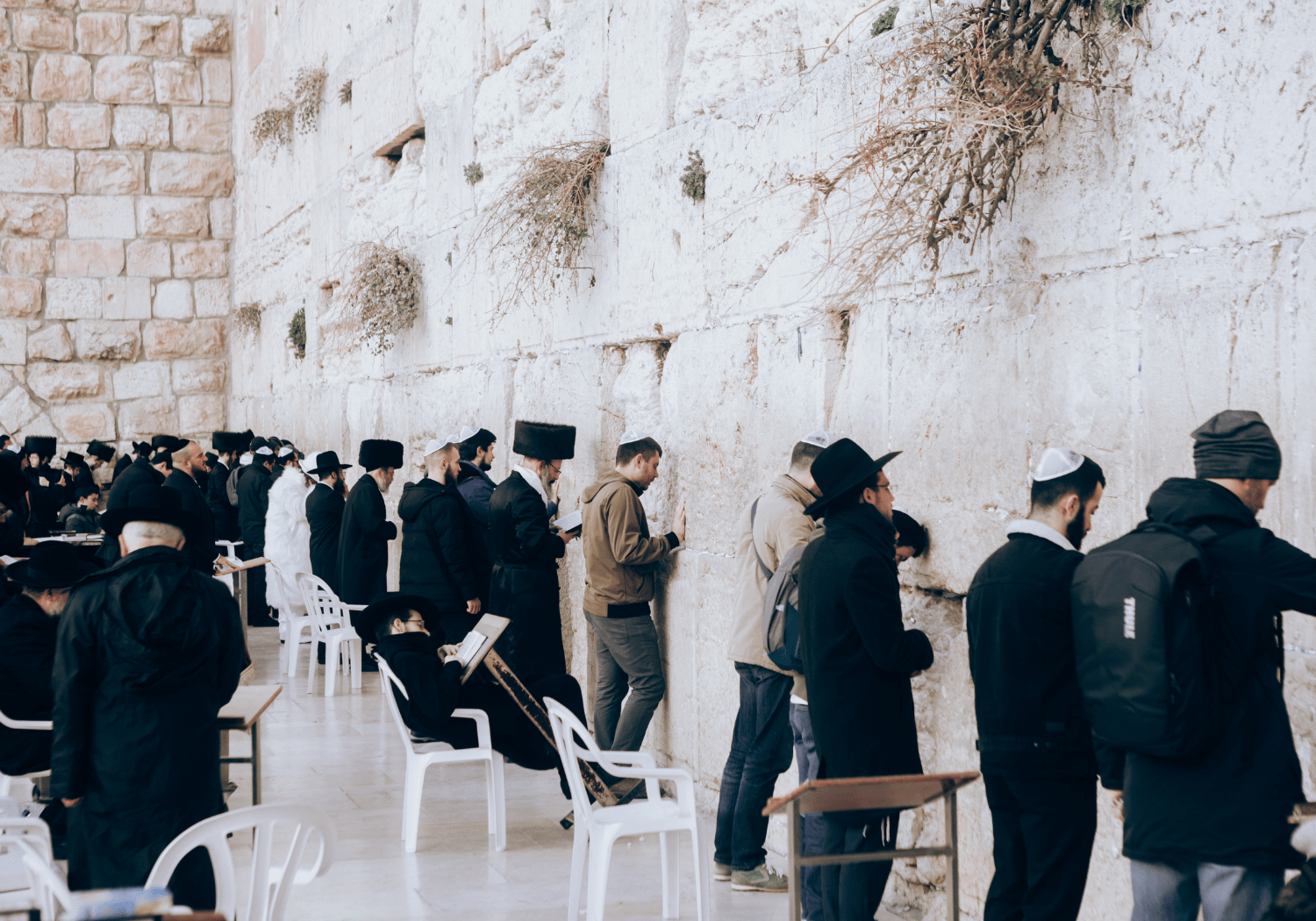 Jews worshipping at the Wailing Wall of Jerusalem.