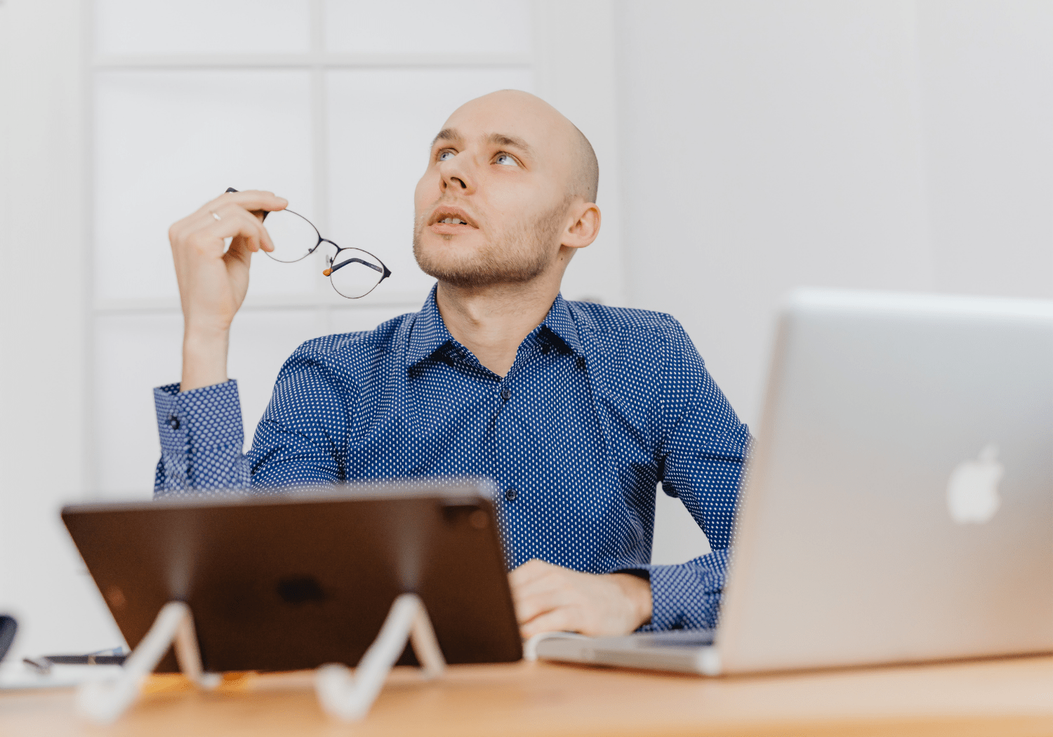 A business man lost in thought.