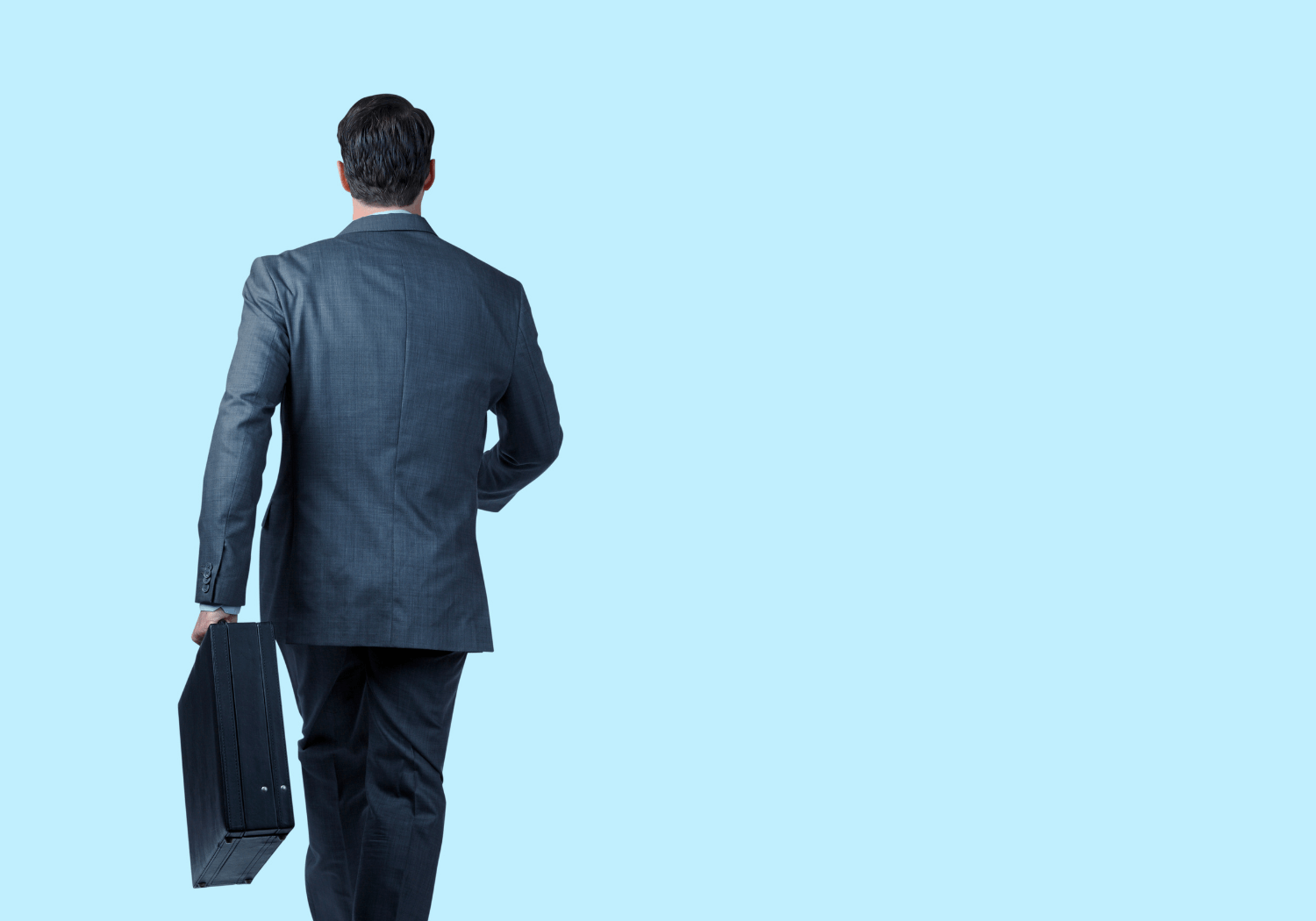 A businessman walking away.