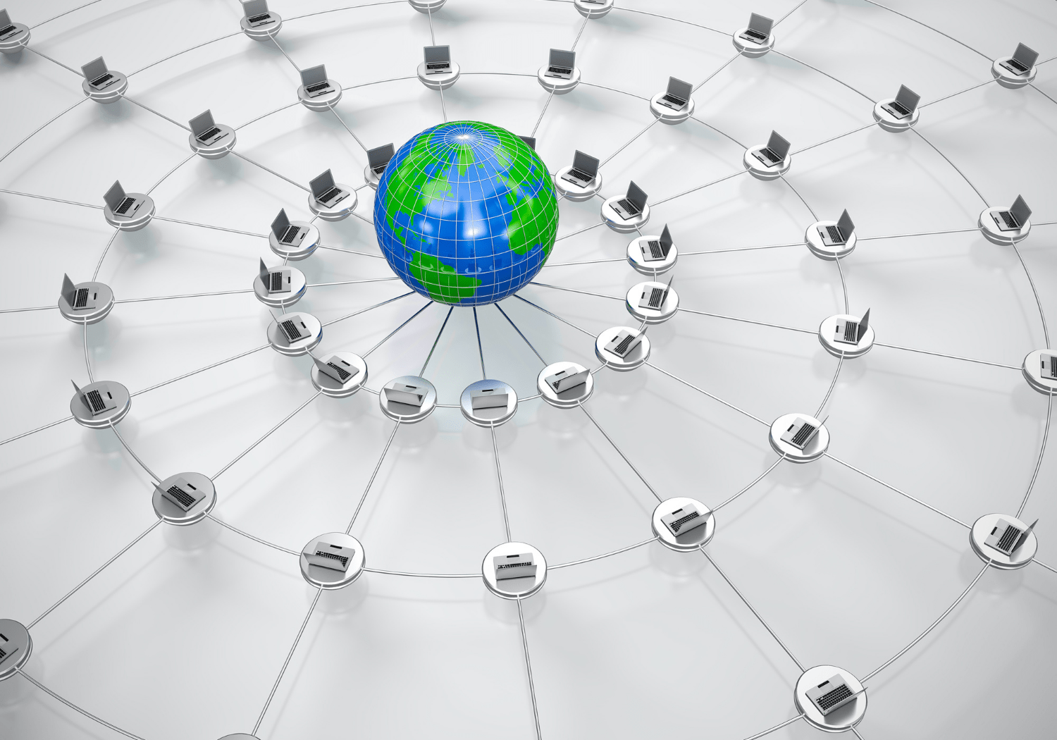 A globe in the middle of a network of computers or laptops.