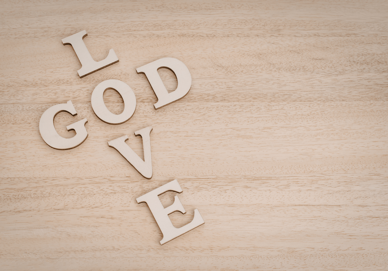 Wooden letters spelling out God and Love.
