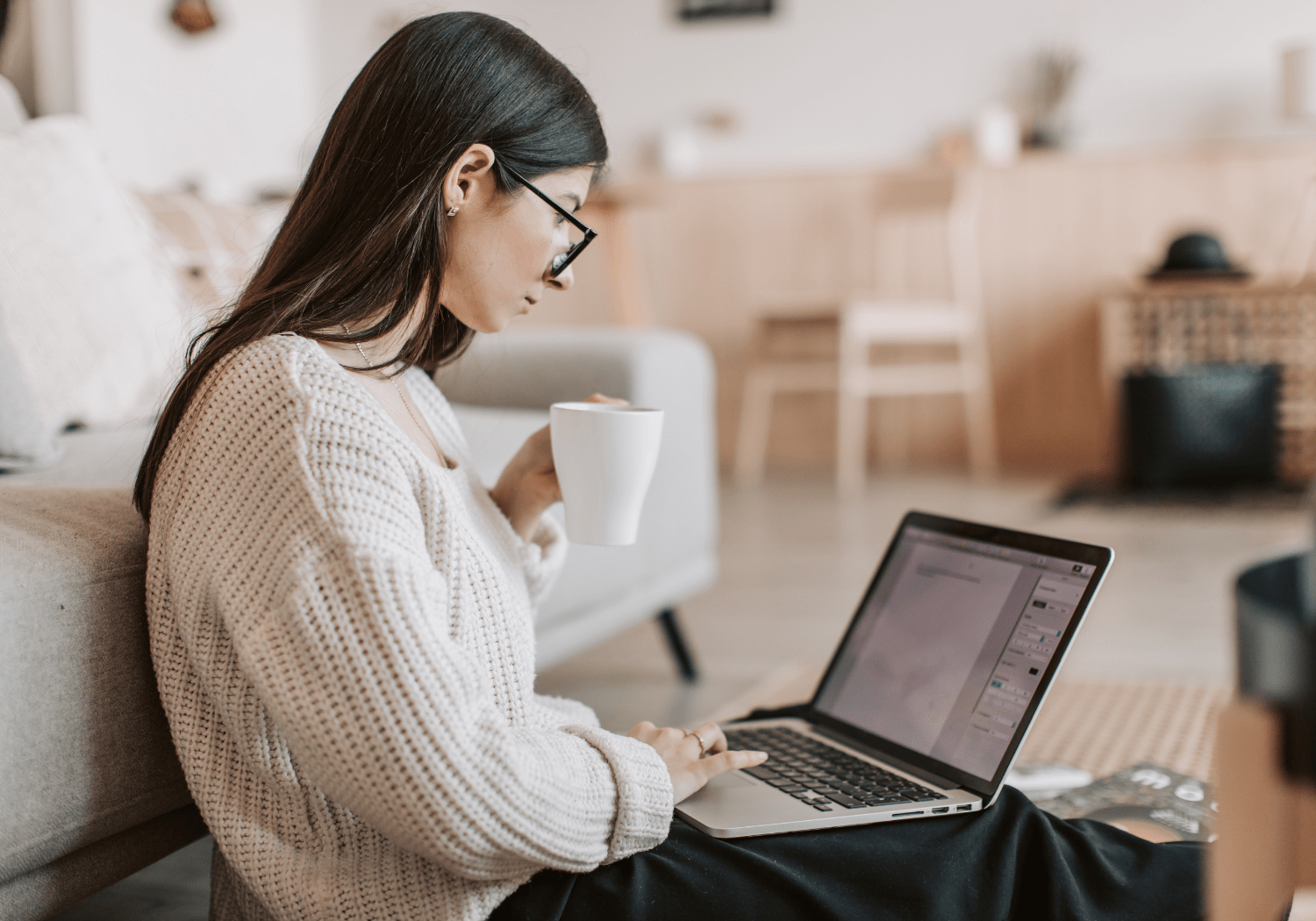 A woman creating content on her laptop.