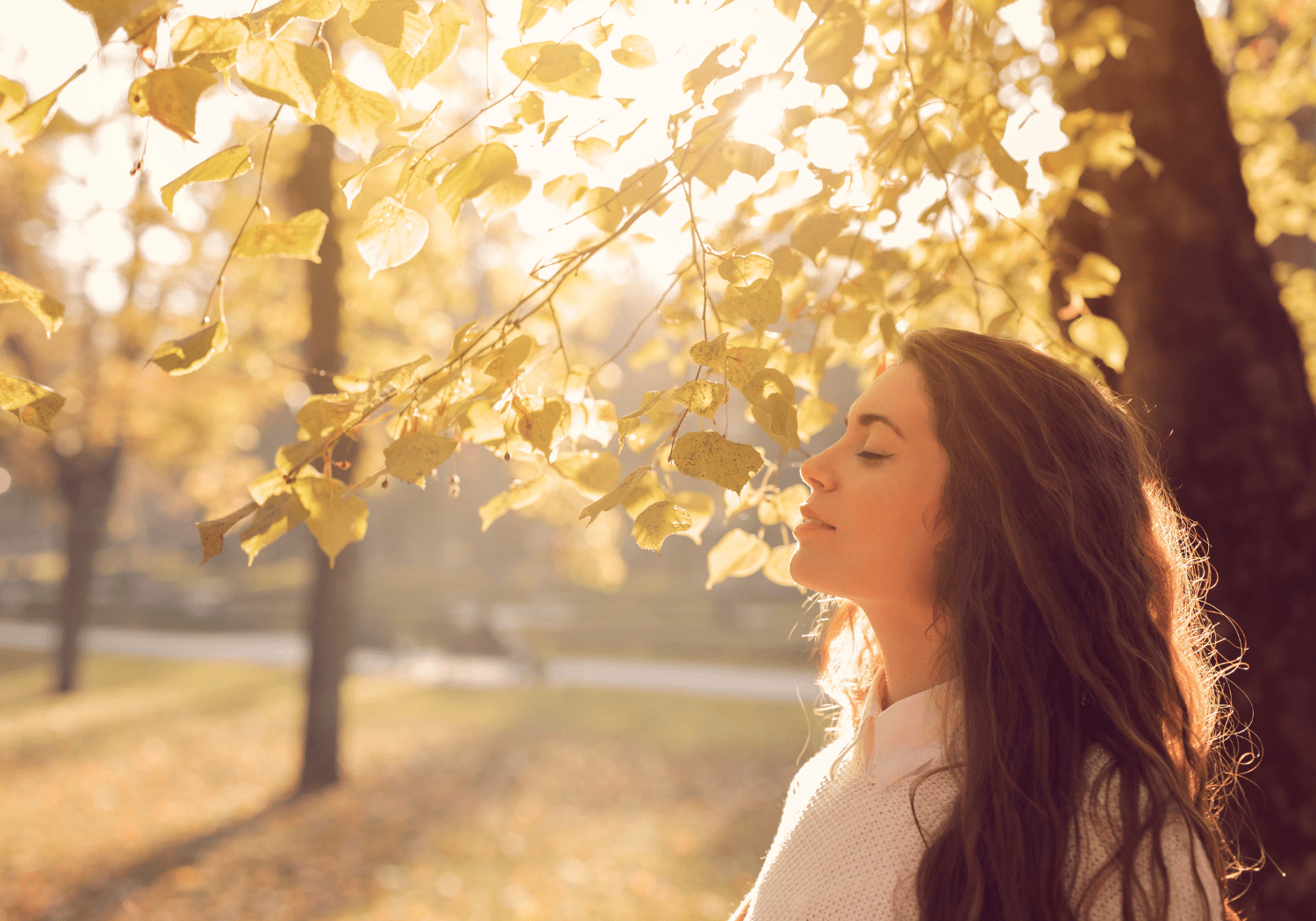 A woman feeling calm and refreshed.